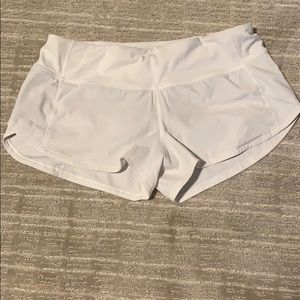 white speed up shorts